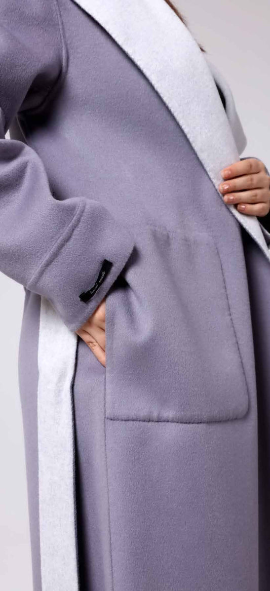 Embrace effortless elegance with this lilac women’s wool coat, featuring soft-touch fabric, deep front pockets, and chic white lapel detail — a perfect choice for refined winter style and timeless comfort