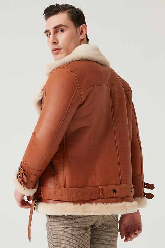 Man wearing a brown leather jacket with white fur lining on a white background