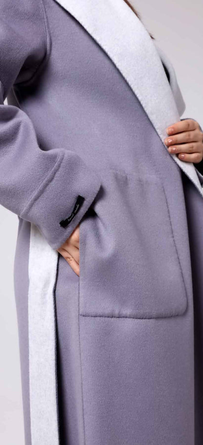 Embrace effortless elegance with this lilac women’s wool coat, featuring soft-touch fabric, deep front pockets, and chic white lapel detail — a perfect choice for refined winter style and timeless comfort