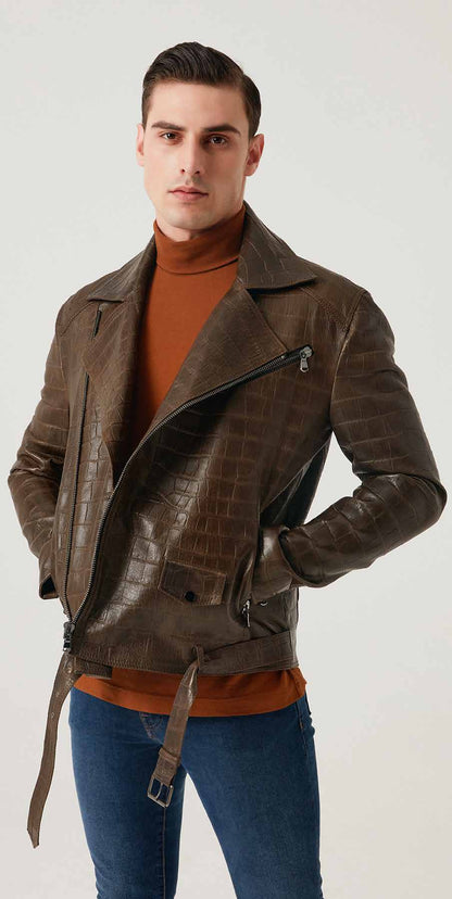 Man wearing a brown leather jacket over an orange sweater on a white background