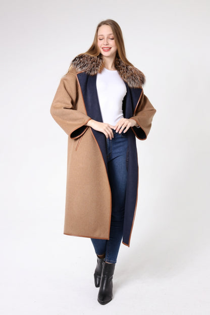 Woman wearing a long brown coat with fur trim on a white background