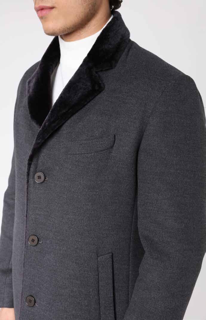 Gray coat with black collar on a white background