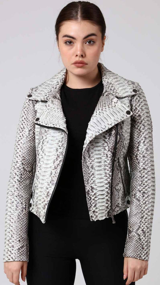 Person wearing a phyton jacket over a black outfit on a plain background