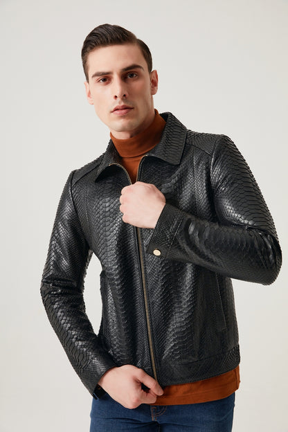 Man wearing a black textured leather jacket on a light gray background