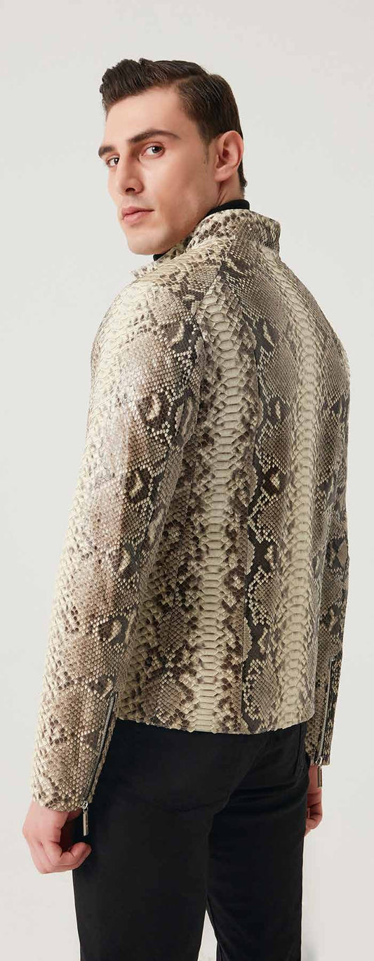 Man wearing a patterned jacket against a white background