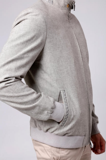 Gray hoodie with a zipper on a white background