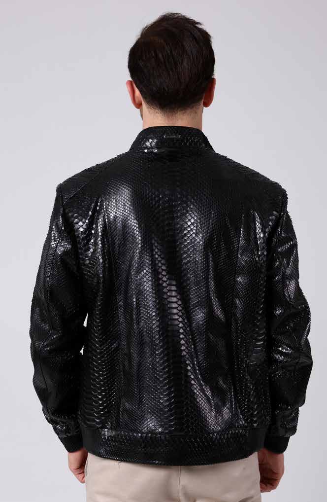 Man wearing a black textured leather jacket on a white background