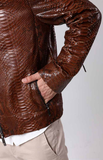 Brown textured leather jacket worn by a person on a white background