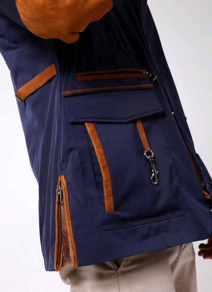 Navy blue jacket with brown zipper details on a white background