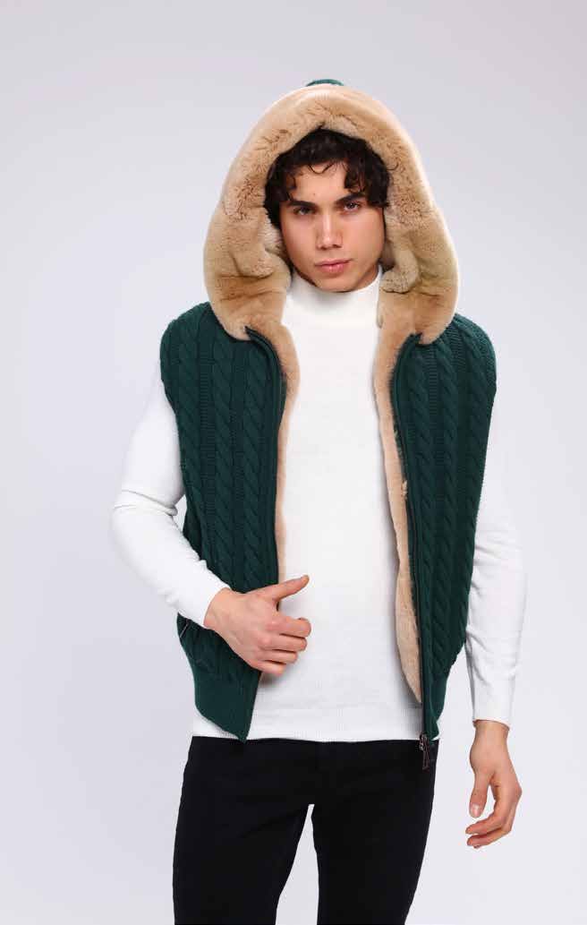 Man wearing a green vest with a fur-lined hood on a white background